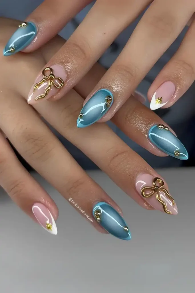 Blue Nails With Gold Coquette Details