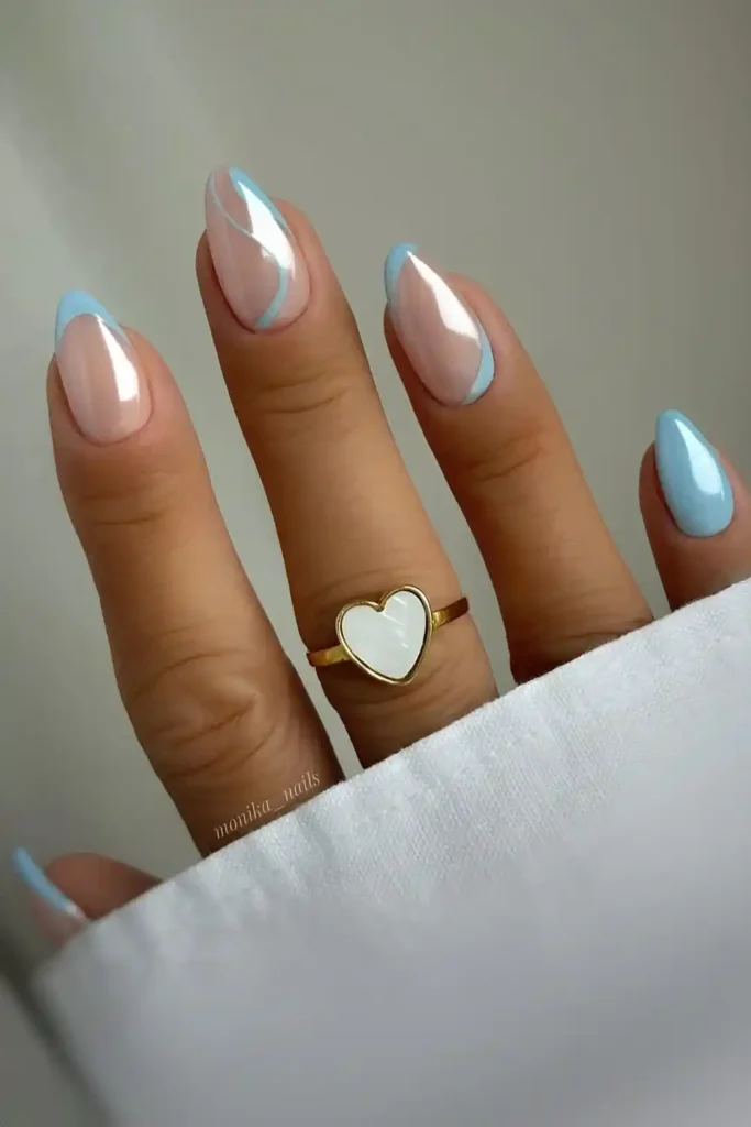 Blue Nails With Swirls And Chrome Finish