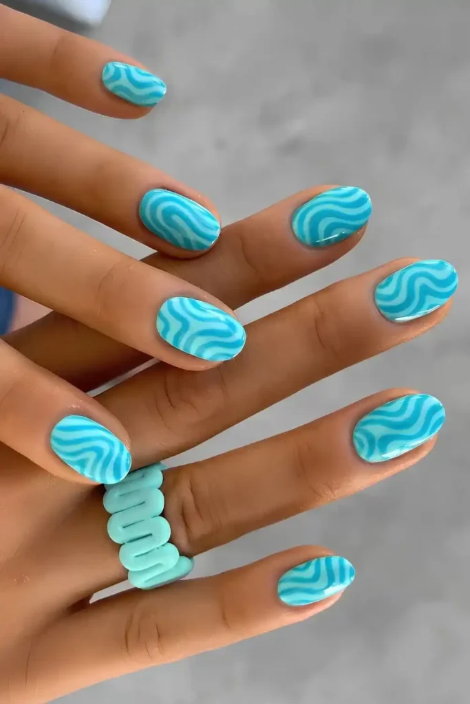 Blue Nails With Wave Pattern Art
