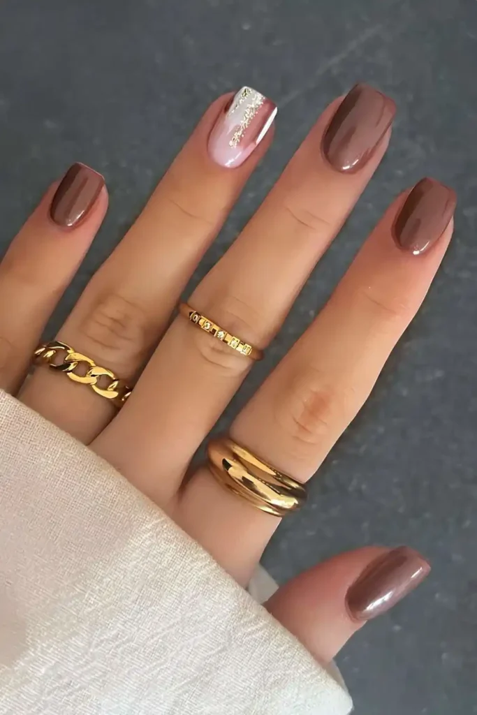 Brown Manicure With Glitter Accent