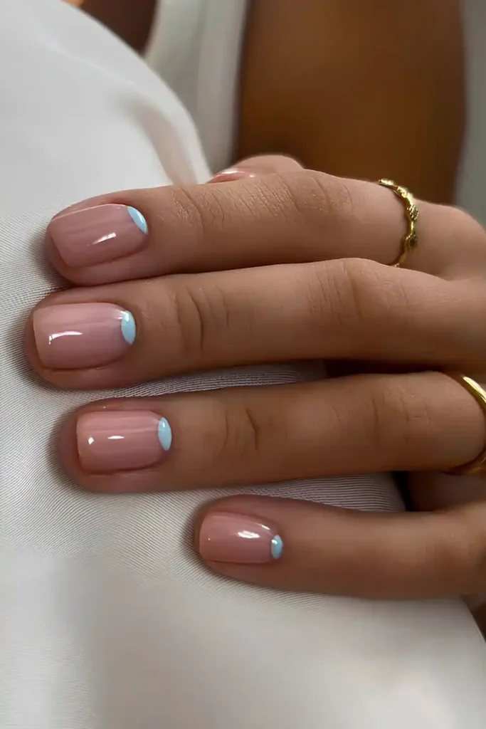 Glossy Nails With Light Blue Half Moon Accents