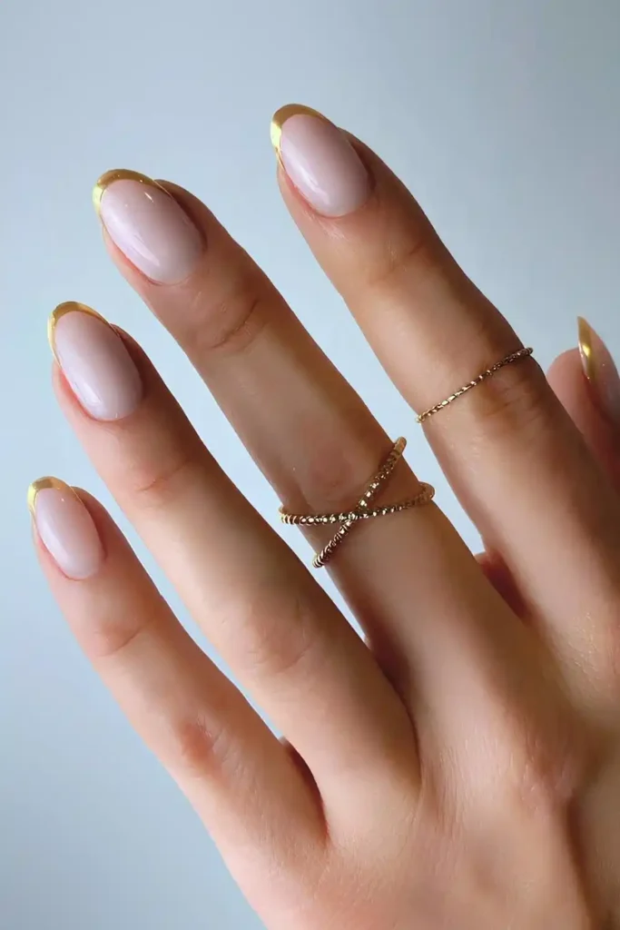 Gold Chrome French Mani on a Milky Base for a Soft Luxe Look