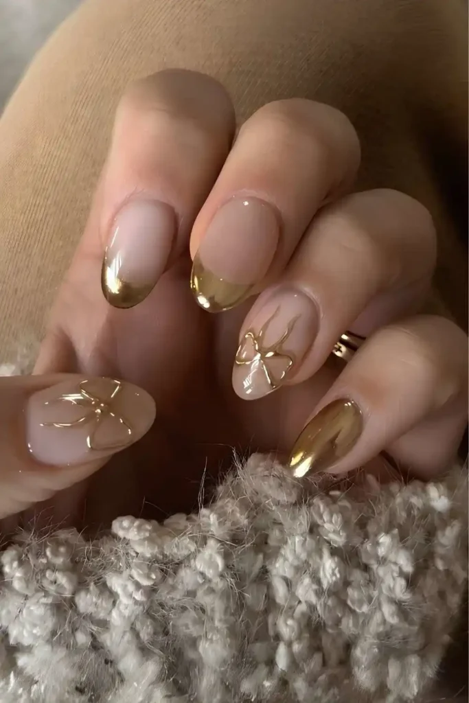 Gold Chrome French Tips With Bow Accent That Sparkle