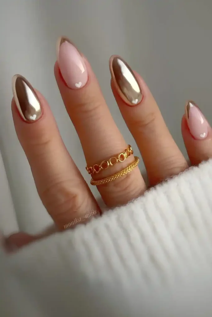 Gold Nails With Accent Hearts and French Tips for a Romantic Touch