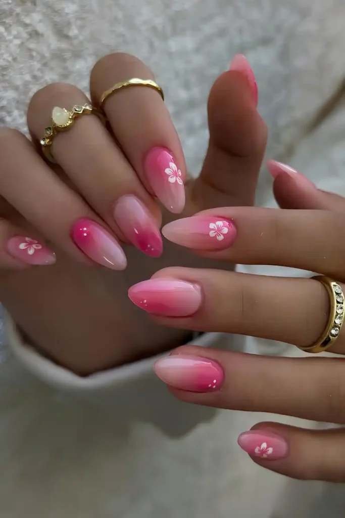 Hot Pink Gradient Nails With Hibiscus Art for a Tropical Touch