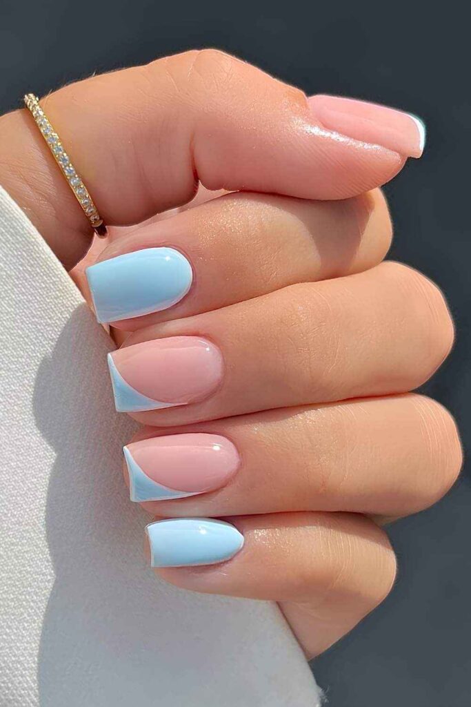 Light Blue Nails With Accent Angled French Tips