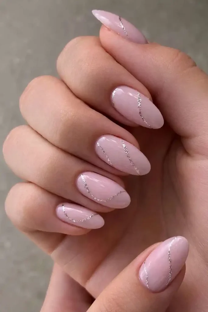 Light Pink Nails With Silver Glitter Line Work That Sparkles