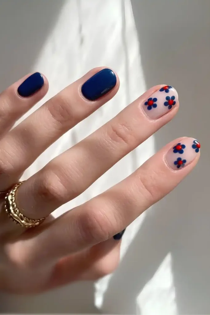 Navy Blue Nails With Daisy Art