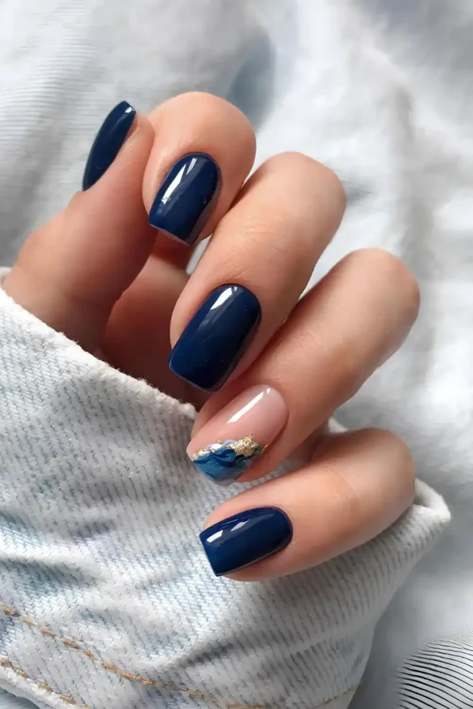 Navy Mani With Marble And Gold Accent