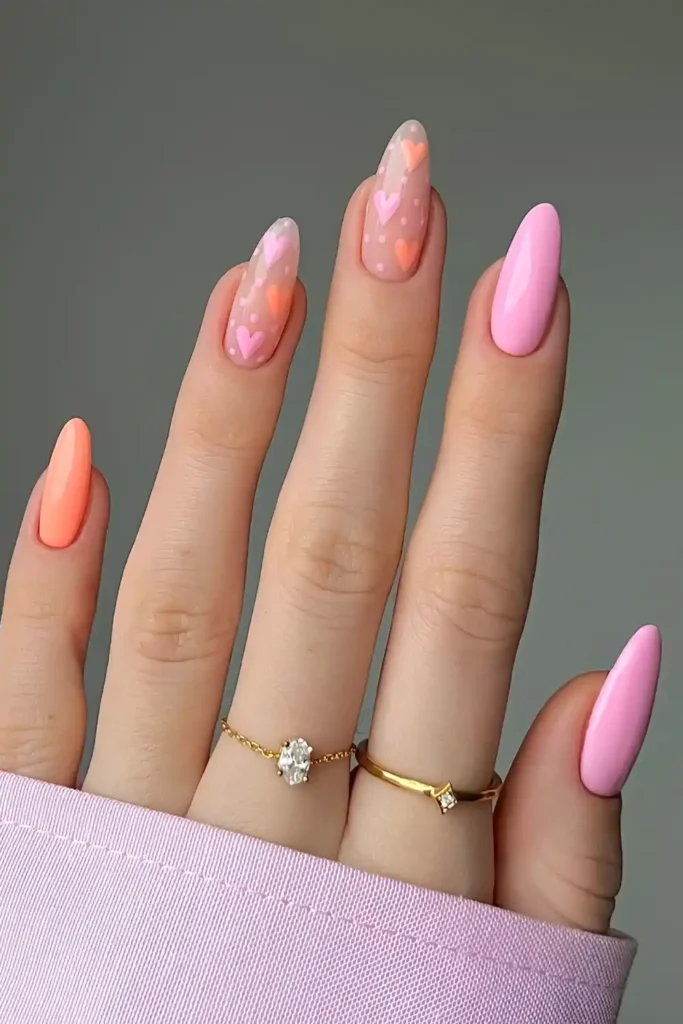 Pink And Orange Nails With Heart Art