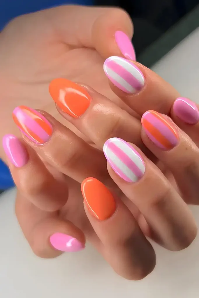 Pink And Orange Nails With Stripes