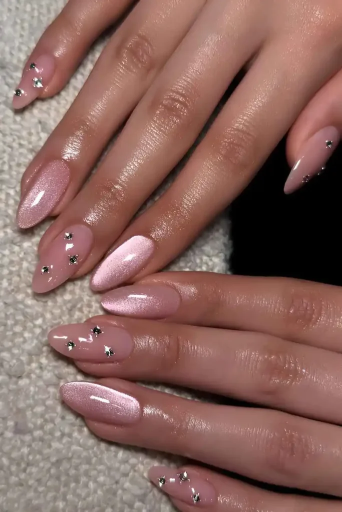 Pink Cat Eye Nails With Rhinestones That Sparkle Beautifully