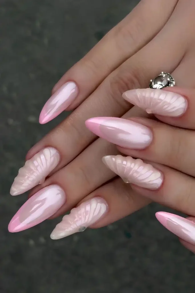 Pink Chrome Mani With Raised Shell Art for a Beach Inspired Look