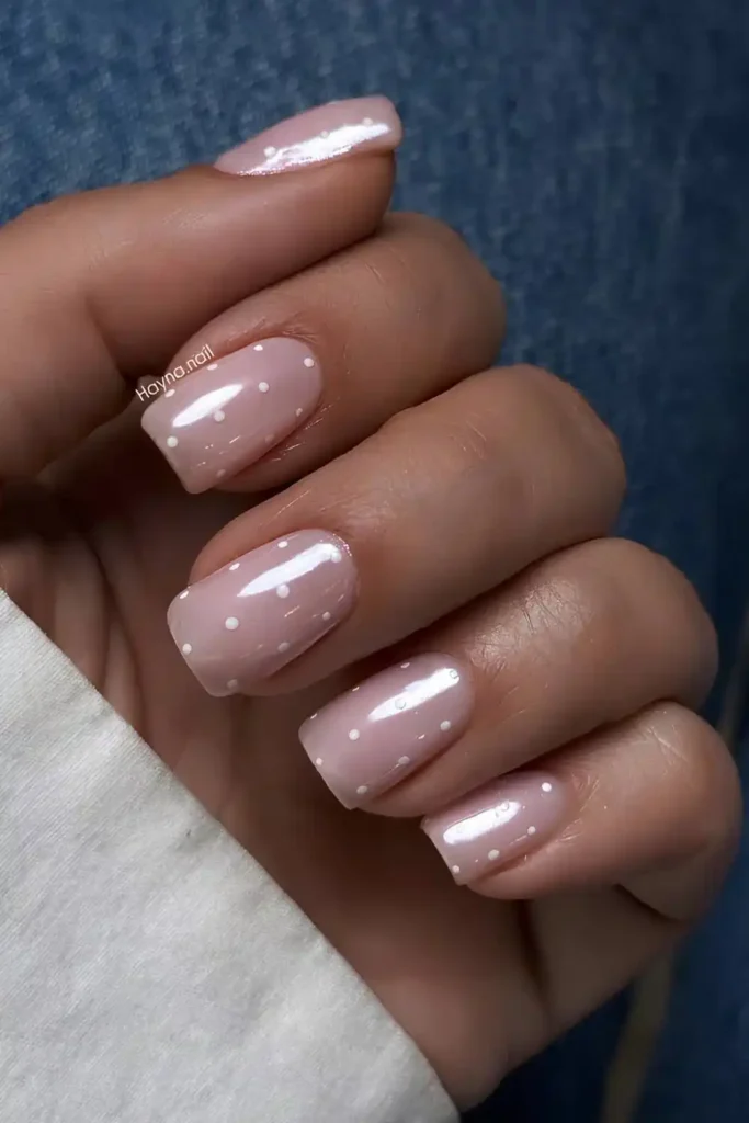 Pink Chrome Nails With Polka Dots for a Fun Trendy Look