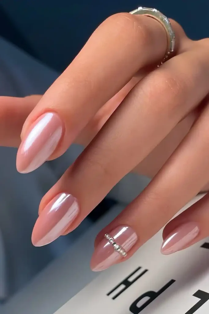 Pink Chrome Nails With Accent Pearls