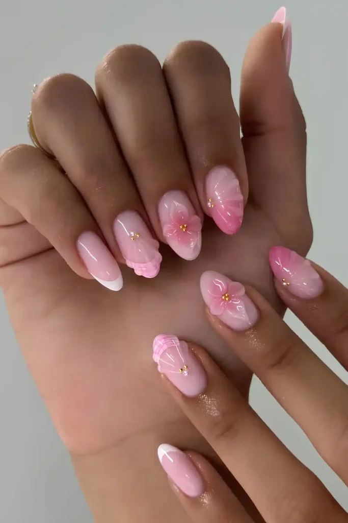 Pink Nails With Flowers And Seashell Art