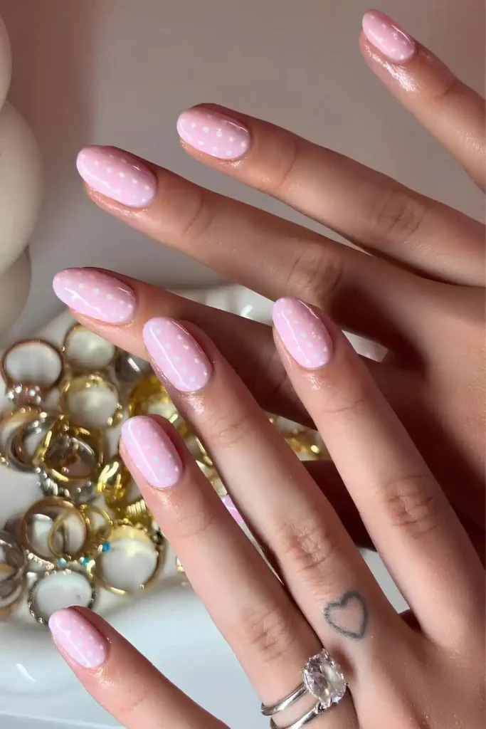 Pink Nails With White Polka Dot Art for a Cute Playful Style