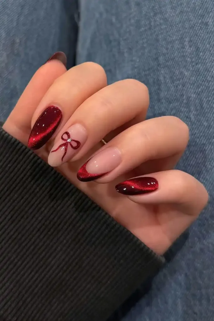Red Cat Eye Nails With Bows for a Cute Glam Look