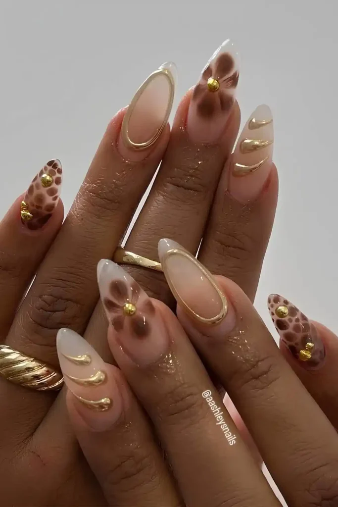Sheer Nails With Brown Blooms And Gold Details