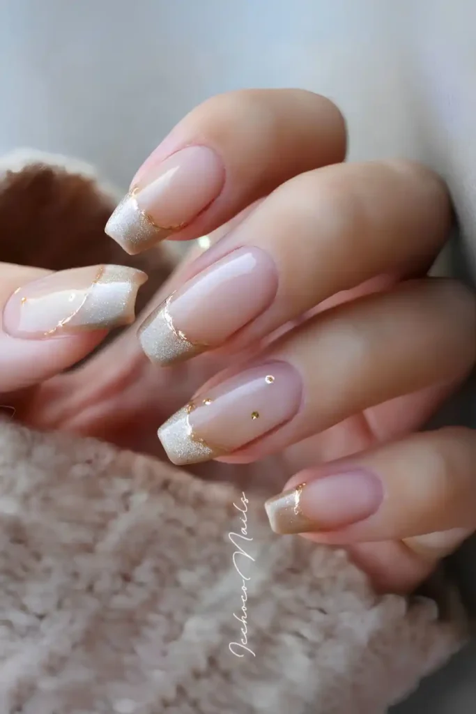 Shimmery Gold French Mani With Gold Outline That Sparkles