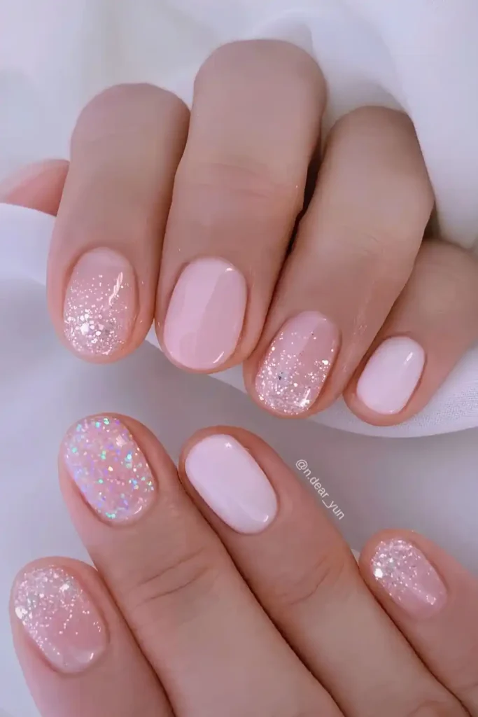 Short Pink Manicure With Glitter That Adds Everyday Glam