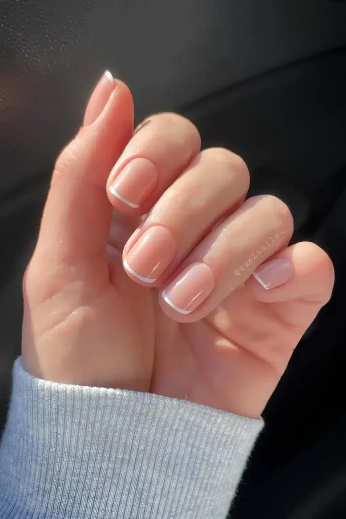 Thin White French Nails for a Clean and Elegant Look
