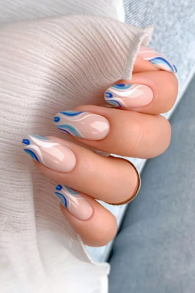 White And Blue Swirl Nails