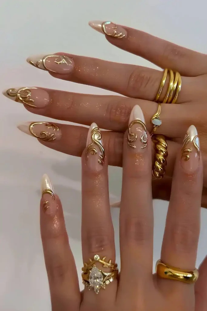 White Chrome French Mani With 3D Gold Art That Looks Luxurious