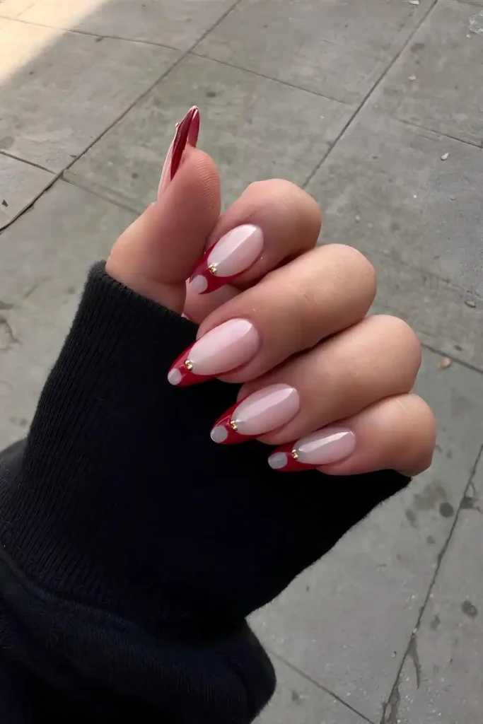 Abstract Red French Tip Nails With a Modern Artistic Touch