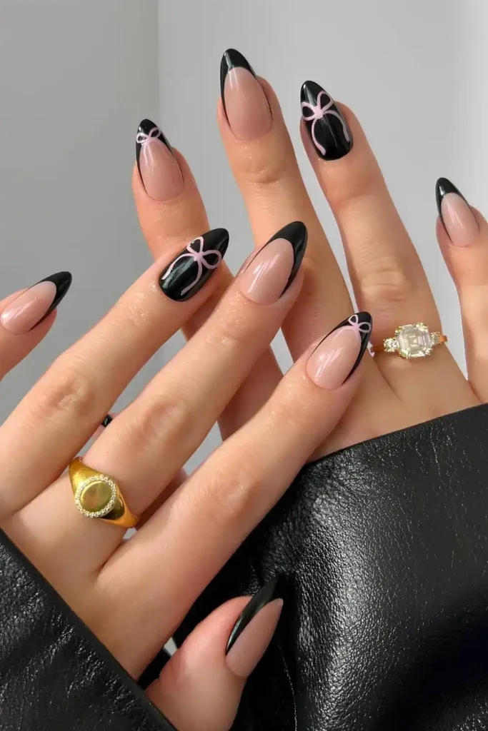 Black French Mani With Accent Pink Bows for a Chic Feminine Style