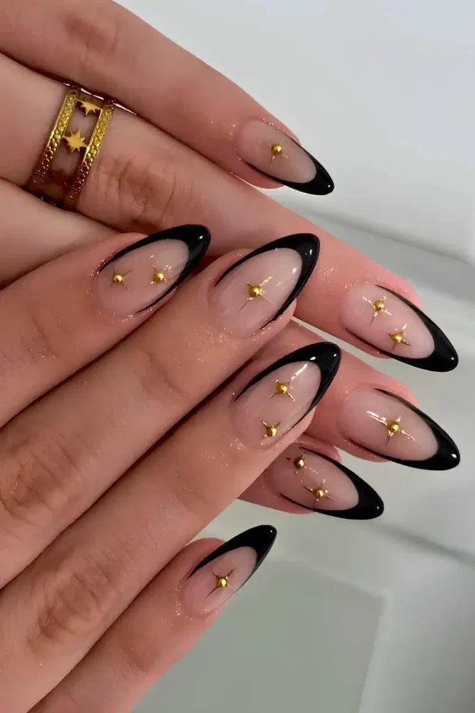 Black French Mani With Gold Celestial Art for a Luxe Finish