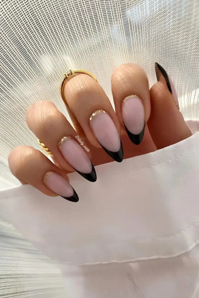 Black French Nails With Gold Glitter at Cuticles
