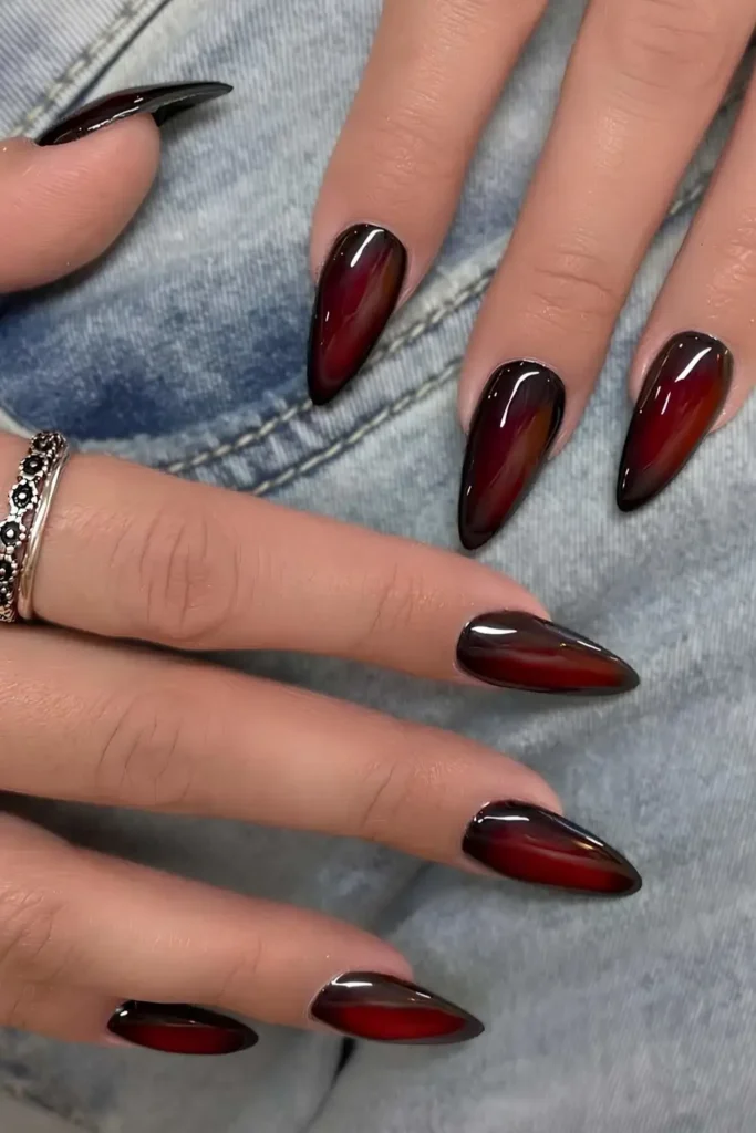 Black and Cherry Red Aura Manicure With a Bold Dramatic Finish