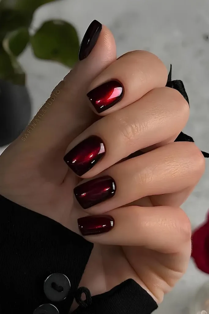 Deep Red Nails With Heart Art for a Romantic Look