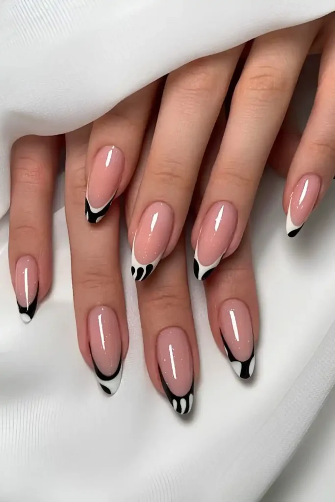Black and White French Nails With Shimmery Neutral Base for a Sophisticated Style