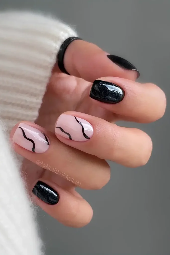 Black Mani With Accent Swirls for a Chic Finish