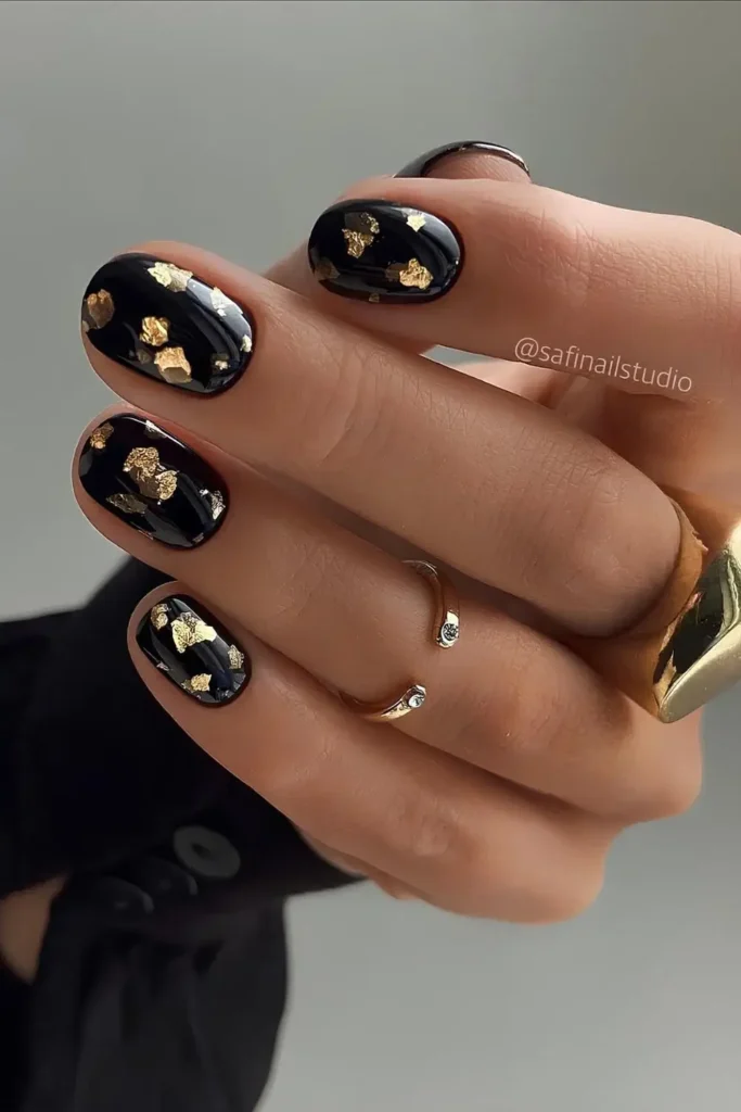 Black Mani With Gold Foil Details for a Luxe Finish