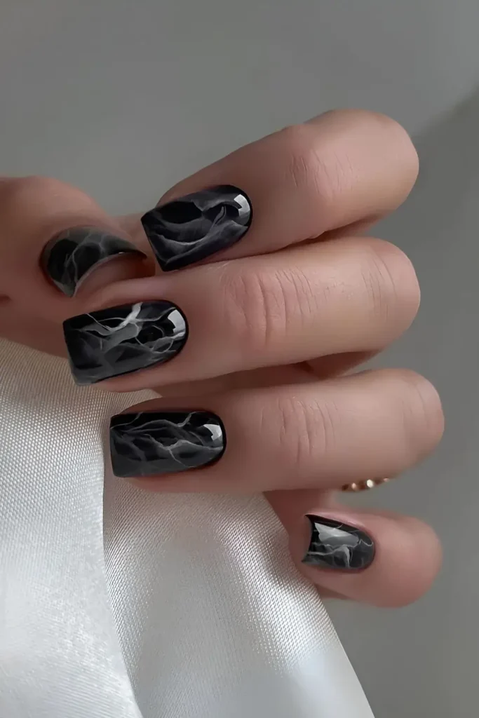 Black Mani With White Marble Effect for an Elegant Finish