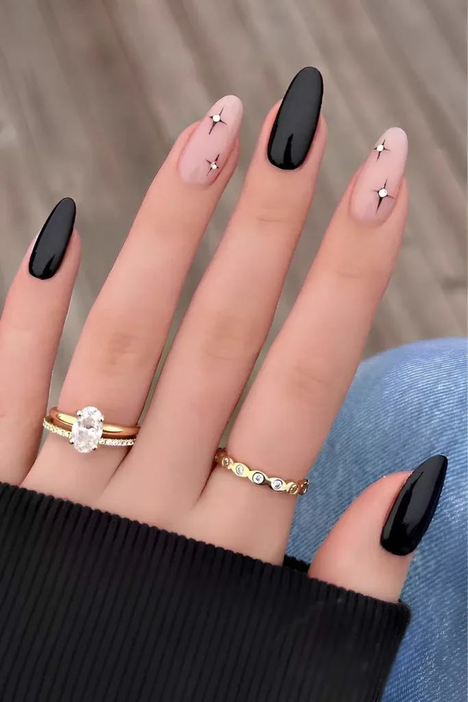 Black Manicure With Celestial Art That Feels Magical
