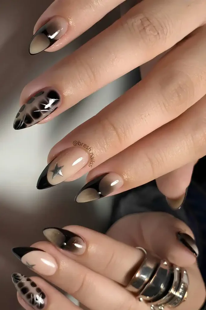 Black Mix and Match Mani With Stars and Animal Print That Stands Out