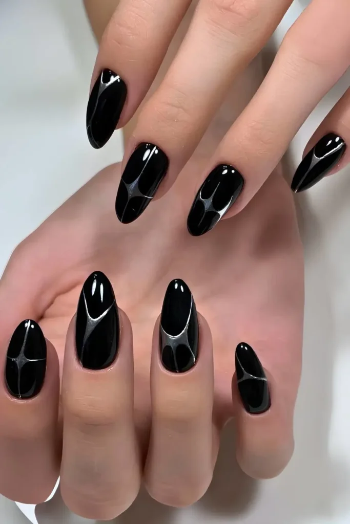 Black Nails With Abstract Silver Lines for a Modern Look