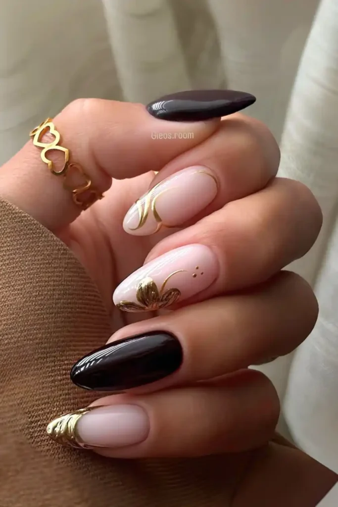 Black Nails With Gold Chrome Florals and Swirls That Make a Statement