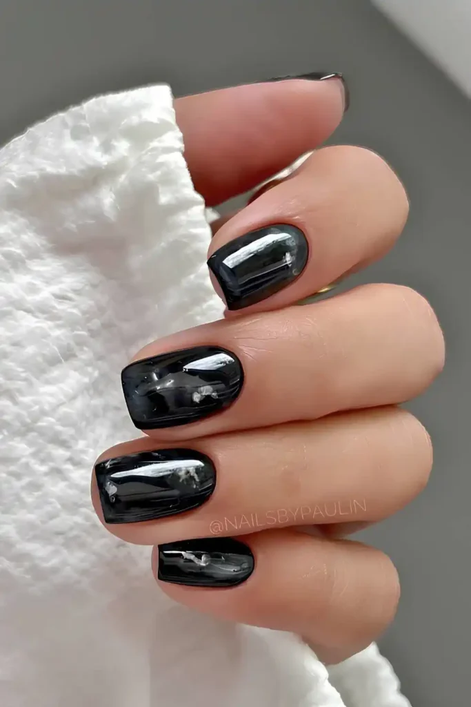 Black Nails With White Marble Details That Look Sophisticated