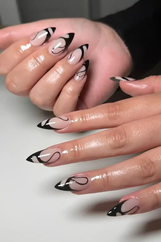 Black Swirly French Almond Nails With a Bold Modern Twist