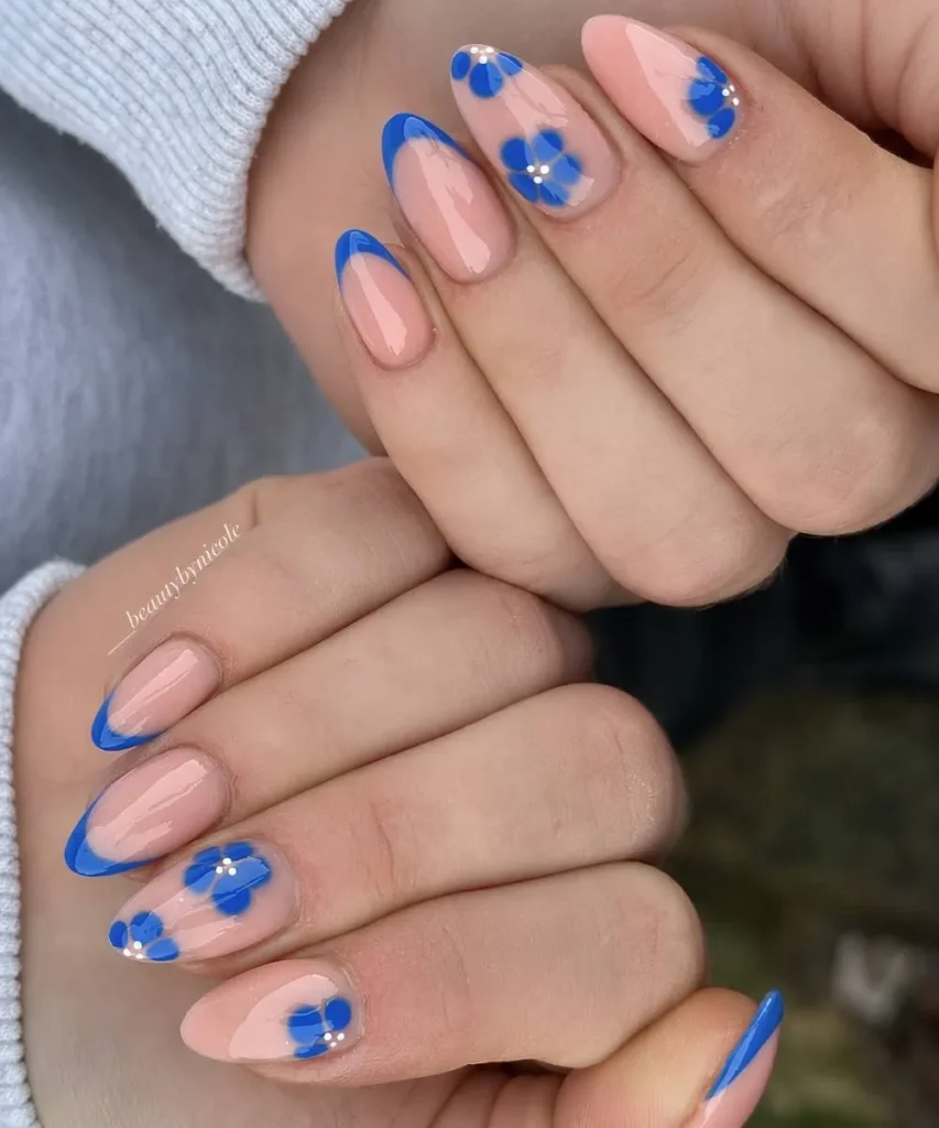Blue French Mani With Blooming Gel Florals for a Soft Floral Look