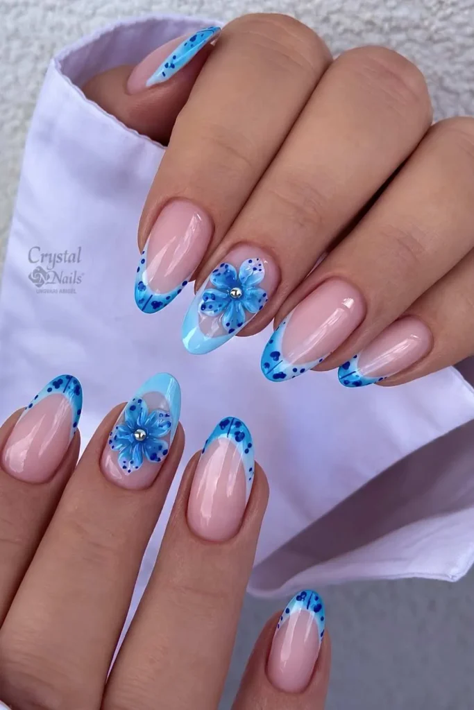 Blue French Mani With Tropical Floral Art for a Fresh Summer Vibe