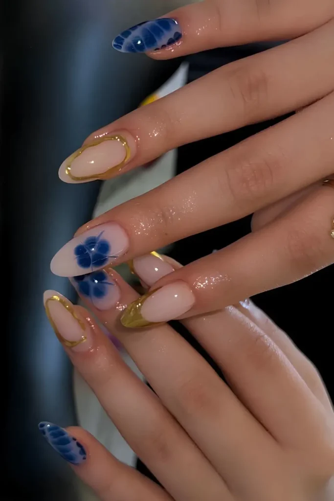 Blue and Gold Floral Manicure That Sparkles Beautifully