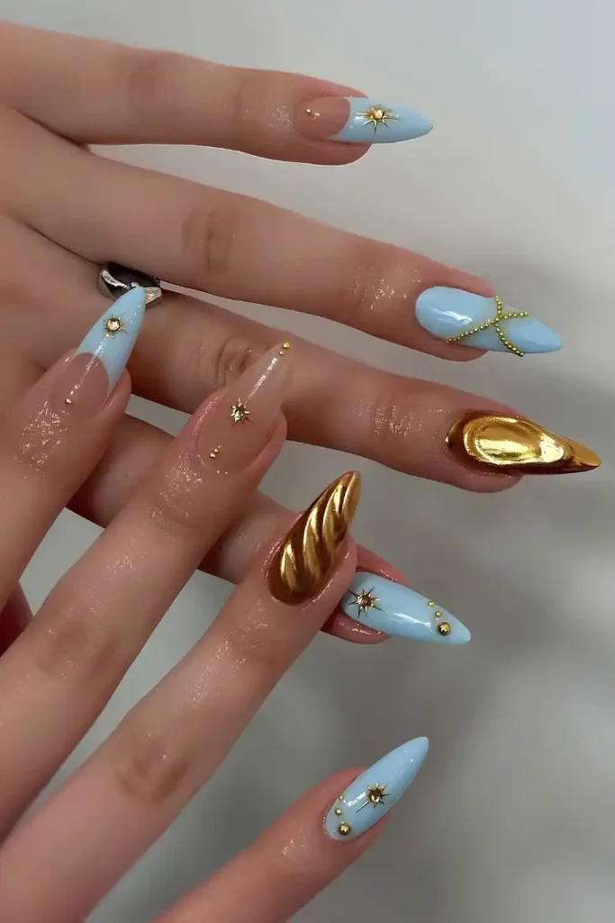 Blue and Gold Nails With 3D Details That Make a Statement