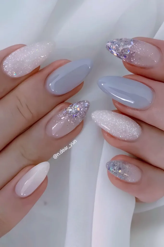 Blue and White Nails With Accent Glitter That Sparkle Beautifully