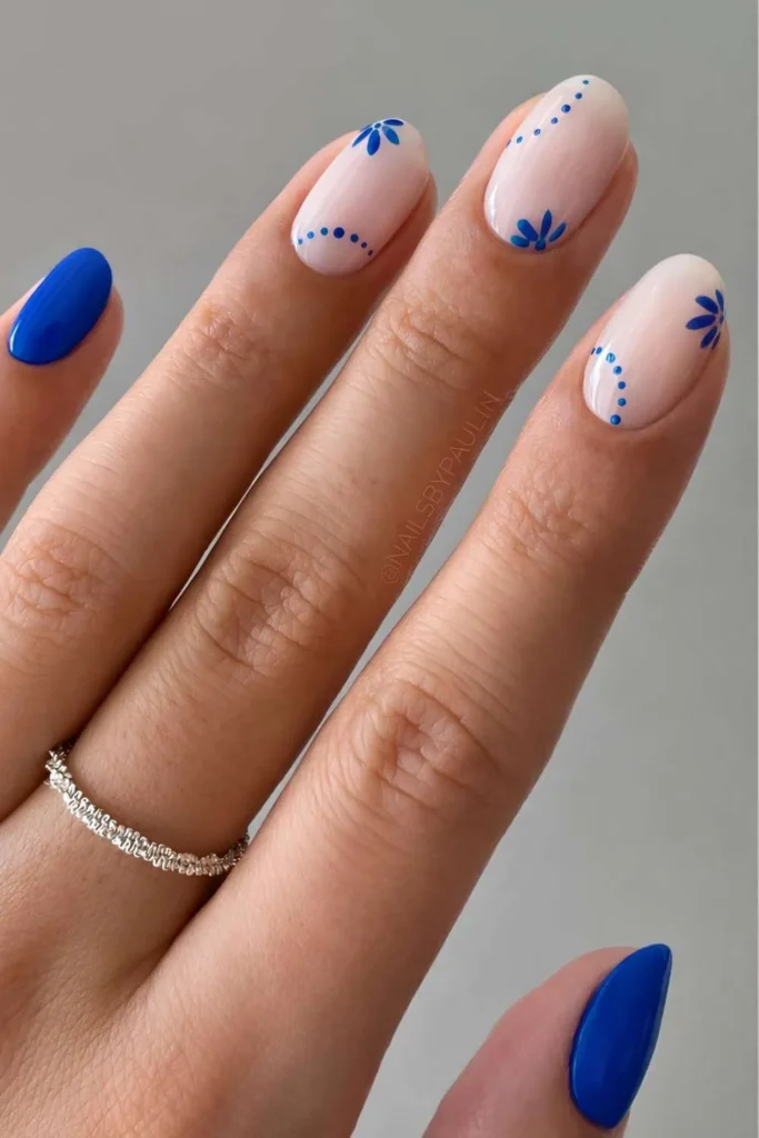 Blue and White Nails With Mediterranean Florals for a Fresh Coastal Look